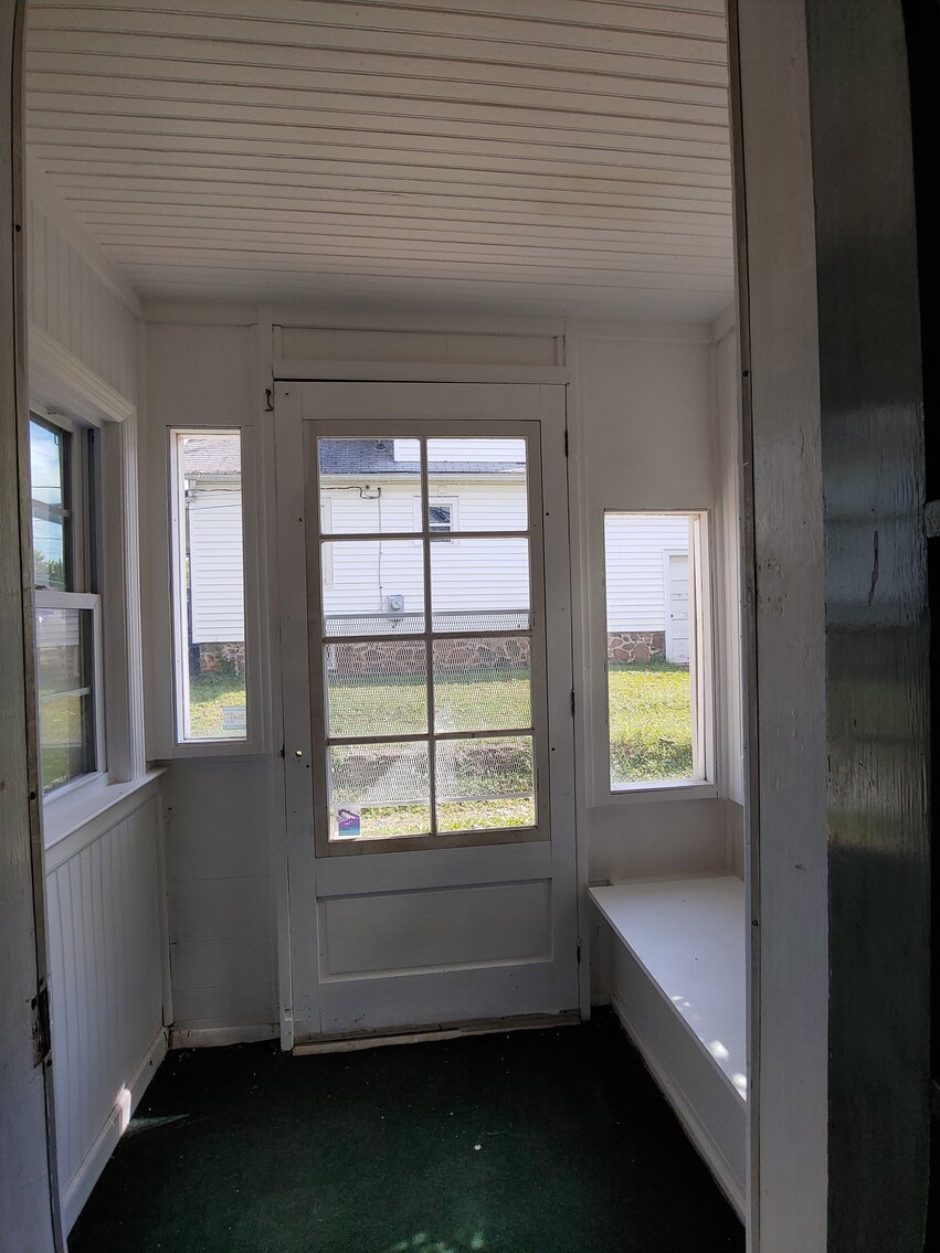 Image for 4 BR, 3 BA BRICK & VINYL SIDED HOME W/ ATT. GARAGE & DET. COMMERCIAL GARAGE W/ OVERSIZED ENTRANCE DOORS ON 0.48+/- ACRES