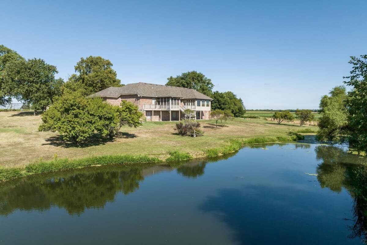 13816 US HWY 50, Halstead, Kansas 67056 – Home, Buildings, & Pond on 8.8 Acres photo 1