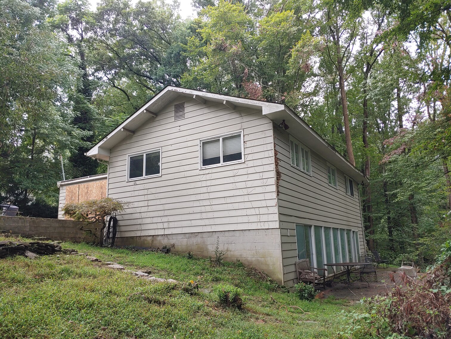 Image for OWNER HAVING SUSTAINED STORM DAMAGE WILL OFFER AT PUBLIC AUCTION 4 BR SPLIT LEVEL HOME W/ 2-CAR ATT GARAGE ON 1+ AC IN ROLLING GREEN COMMUNITY