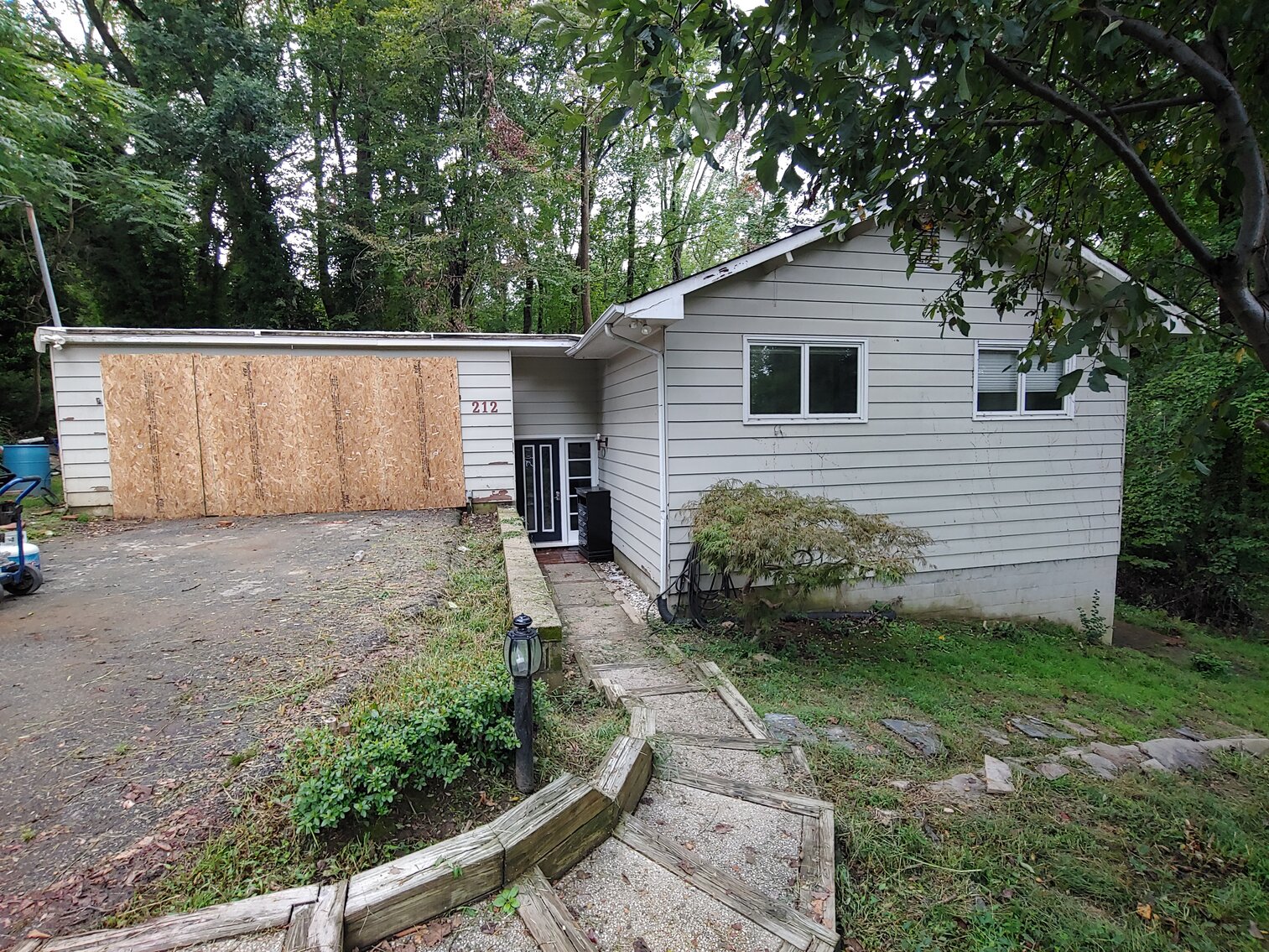 Image for OWNER HAVING SUSTAINED STORM DAMAGE WILL OFFER AT PUBLIC AUCTION 4 BR SPLIT LEVEL HOME W/ 2-CAR ATT GARAGE ON 1+ AC IN ROLLING GREEN COMMUNITY
