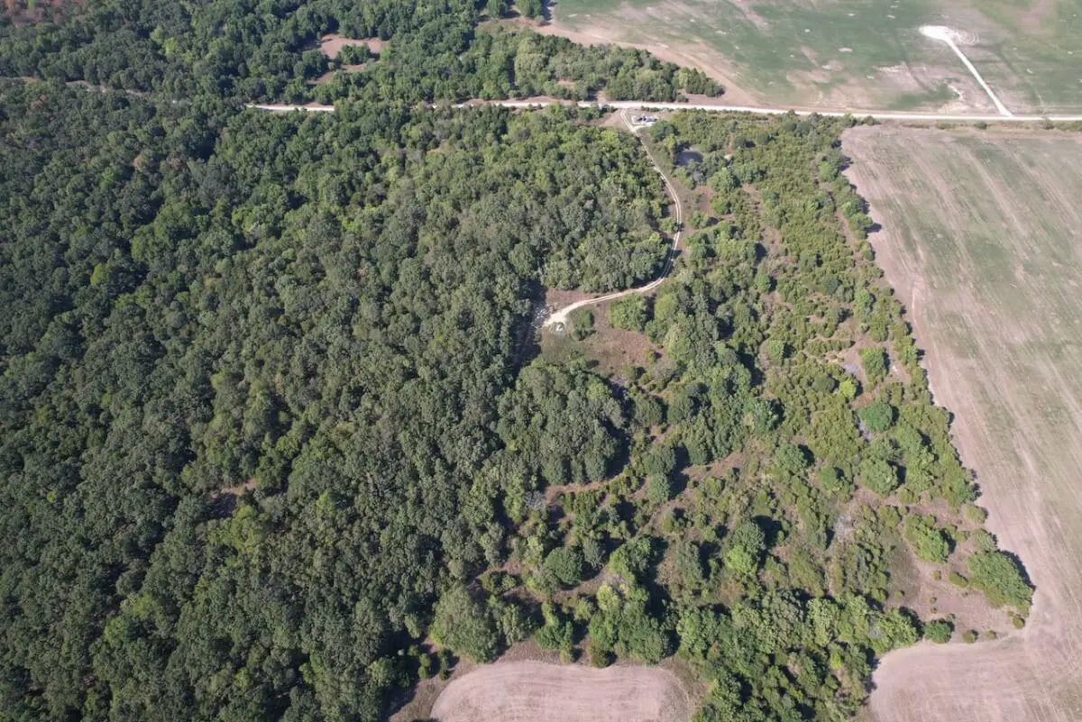 34.5 Acres Montgomery County, Kansas Land For Sale – Pond, Big Hills, Heavy Timber, Oil Income photo 1