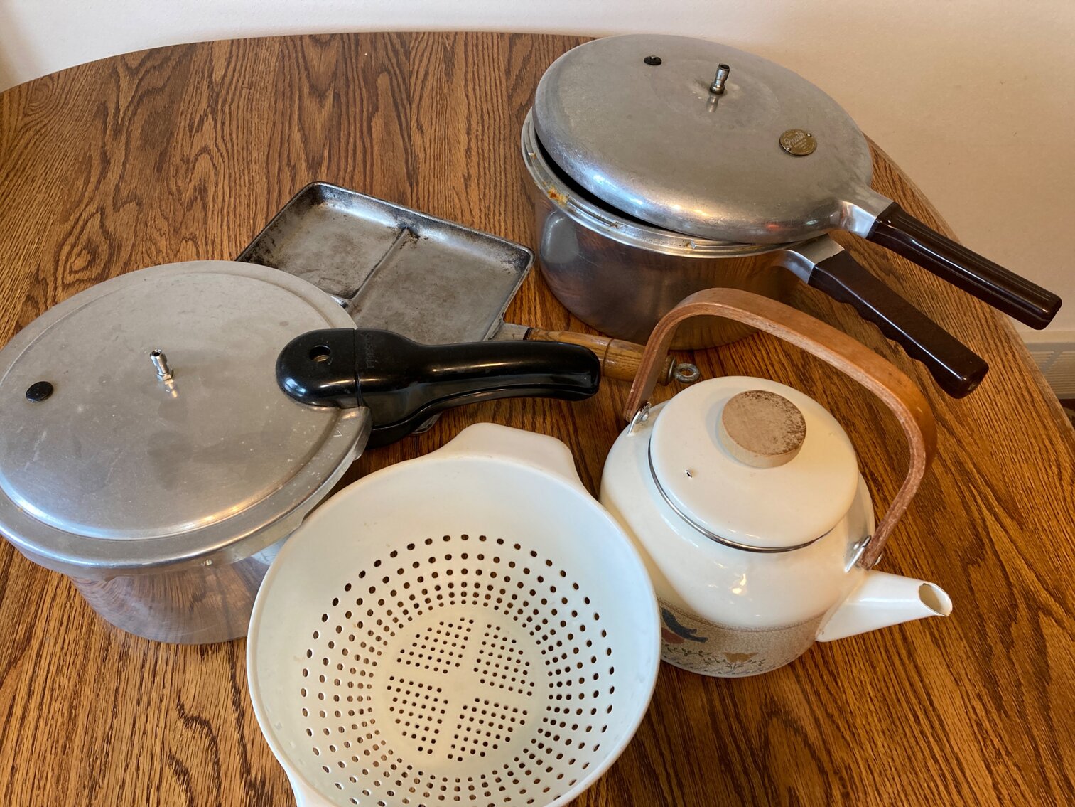 Pressure Cookers And Tea Pot