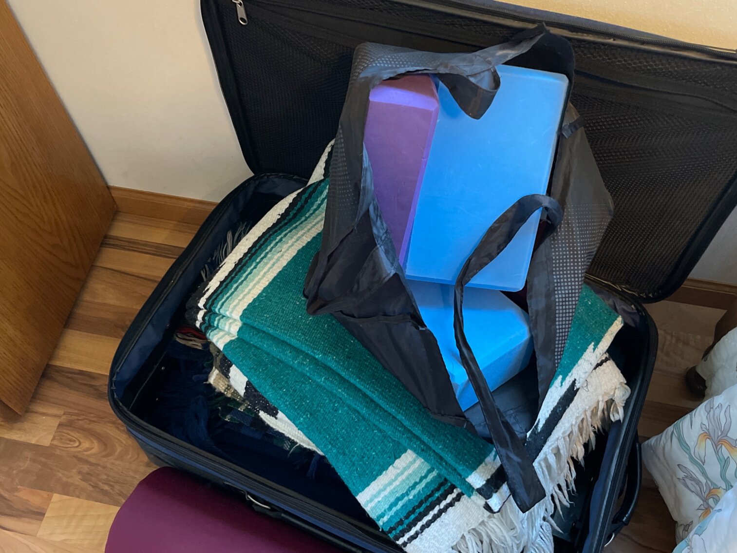Suitcase of Yoga Mats, Blankets and Yoga Blocks
