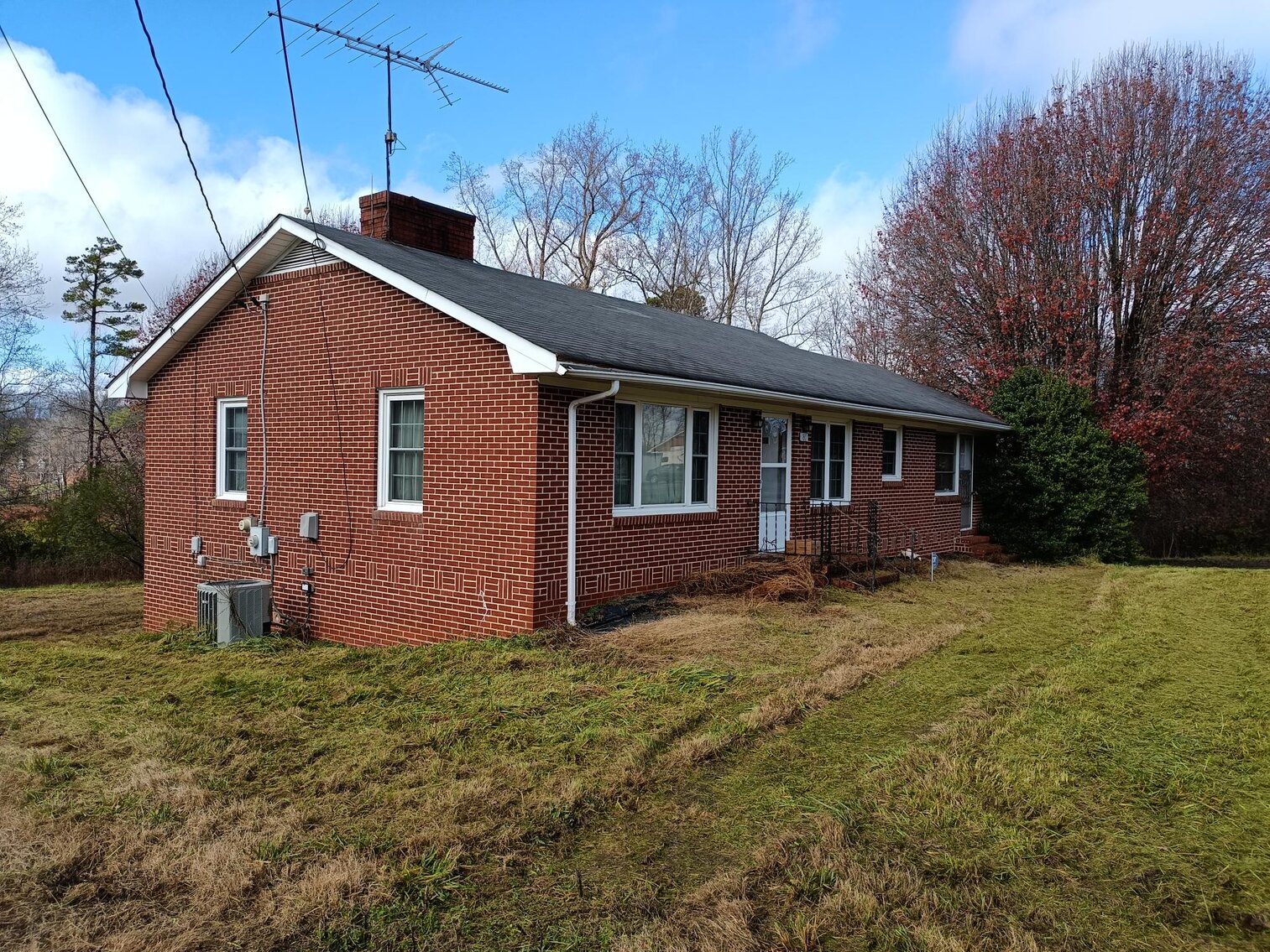 Image for Commissioner's Sale - 2 Properties - Brick Home in Pinnacle, NC & Singlewide in Dobson, NC