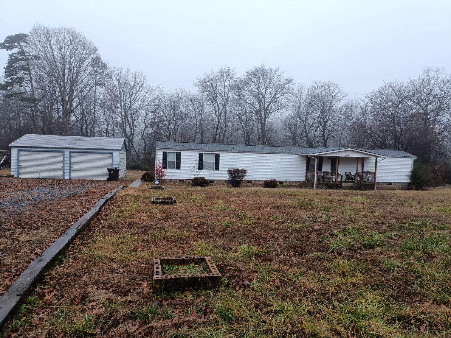 Image for Commissioner's Sale - 2 Properties - Brick Home in Pinnacle, NC & Singlewide in Dobson, NC