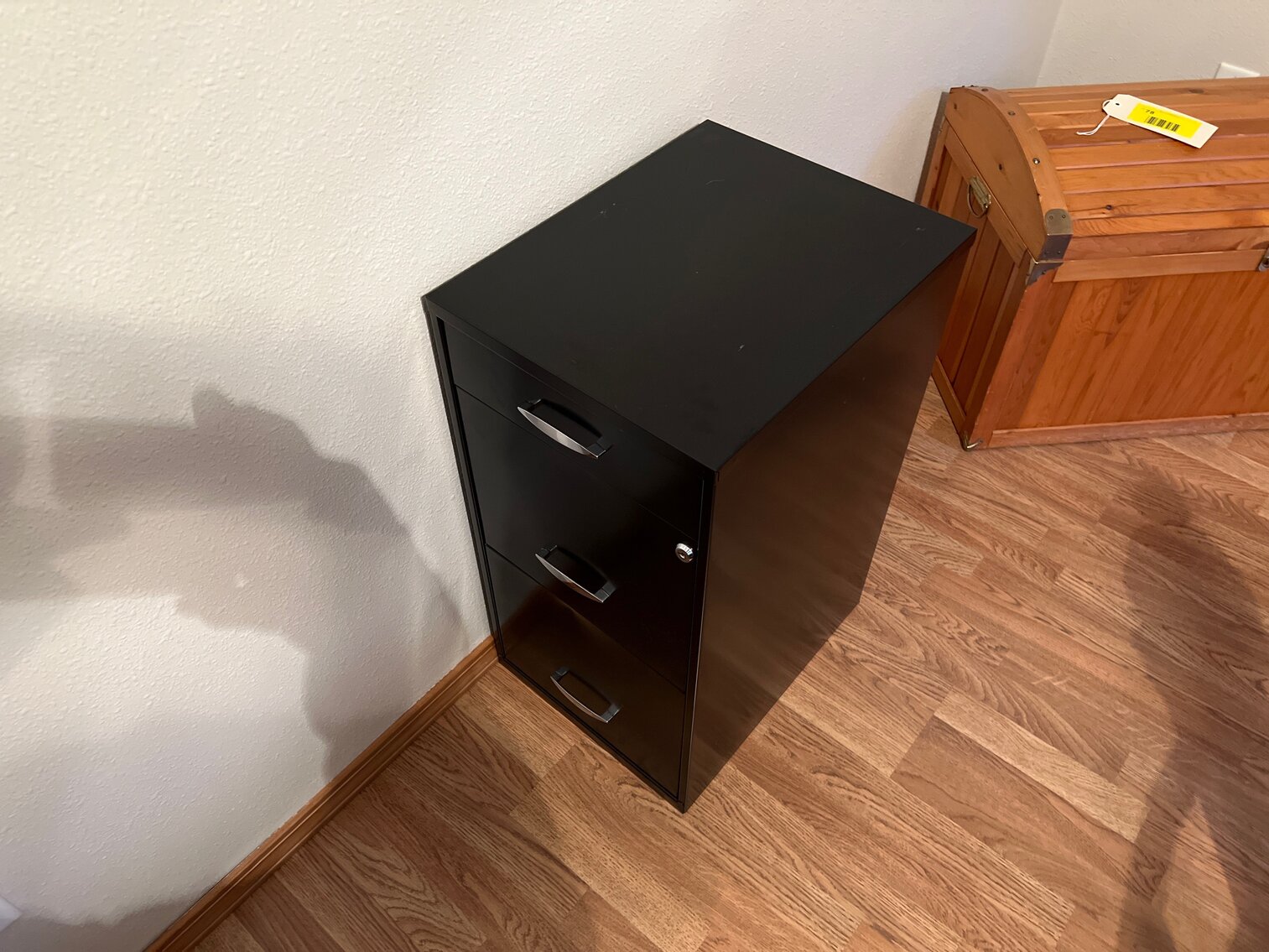 Three drawer file cabinet