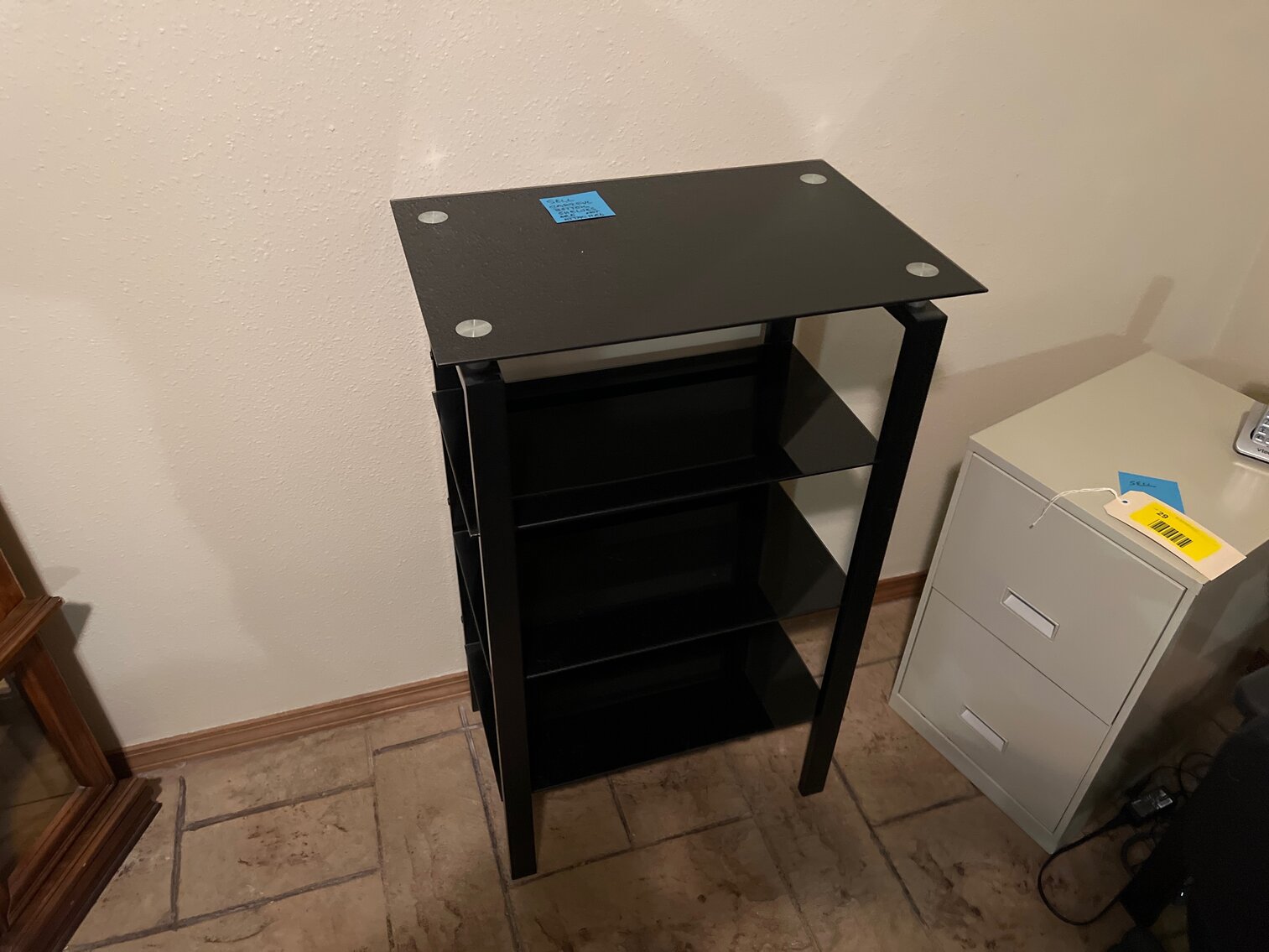 Glass top table with glass shelves