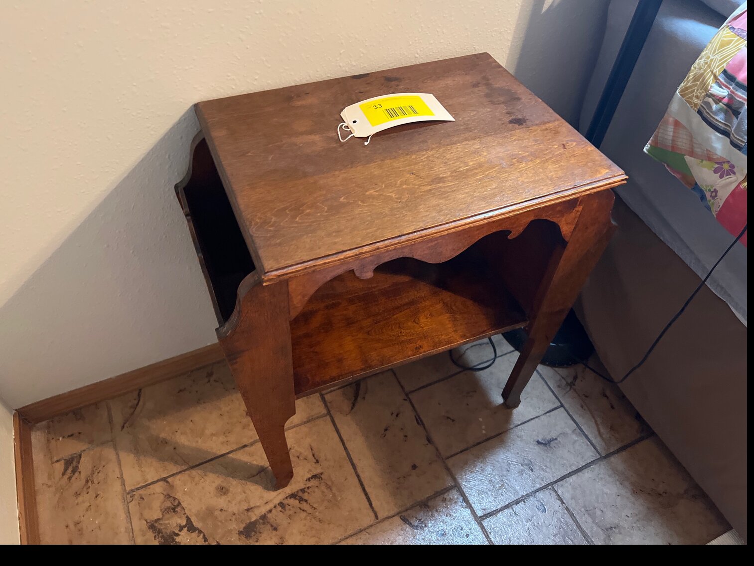Antique table with magazine rack