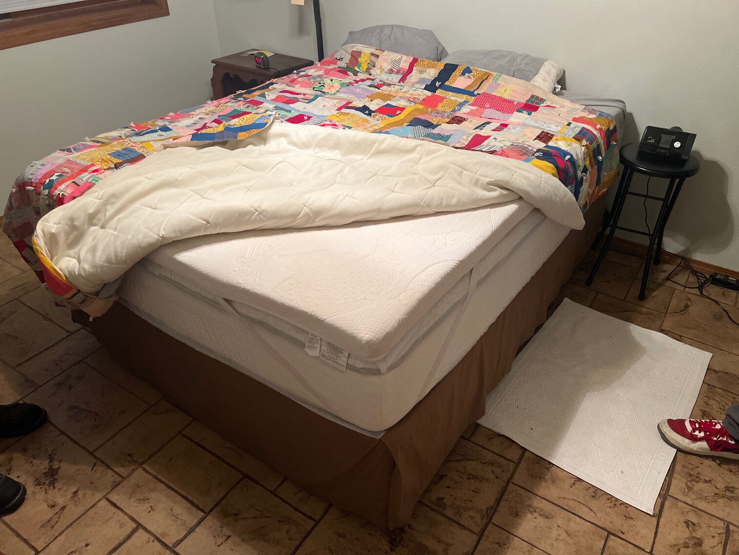 Queen size bed with memory foam topper