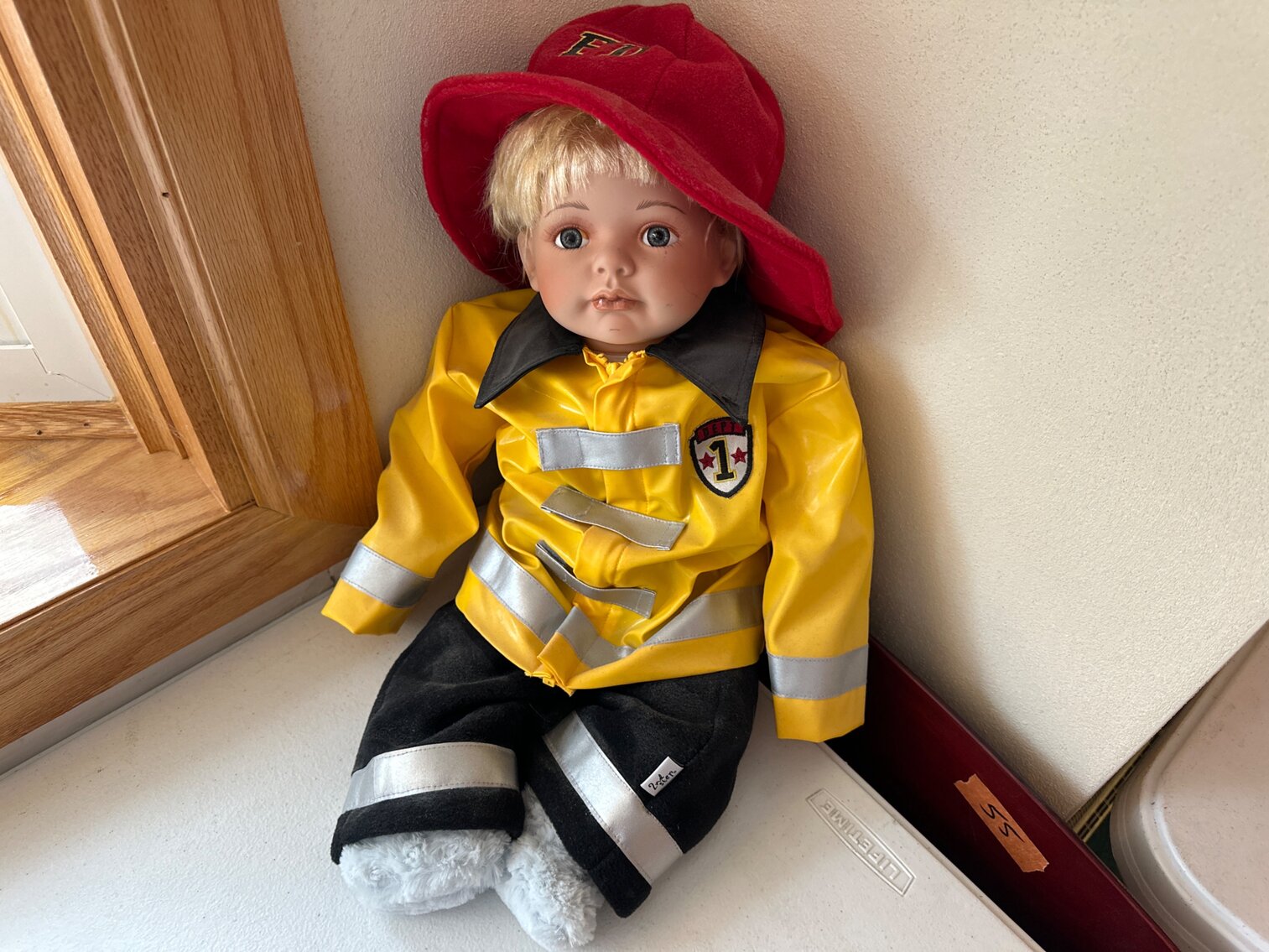 Fireman Porcelain Doll