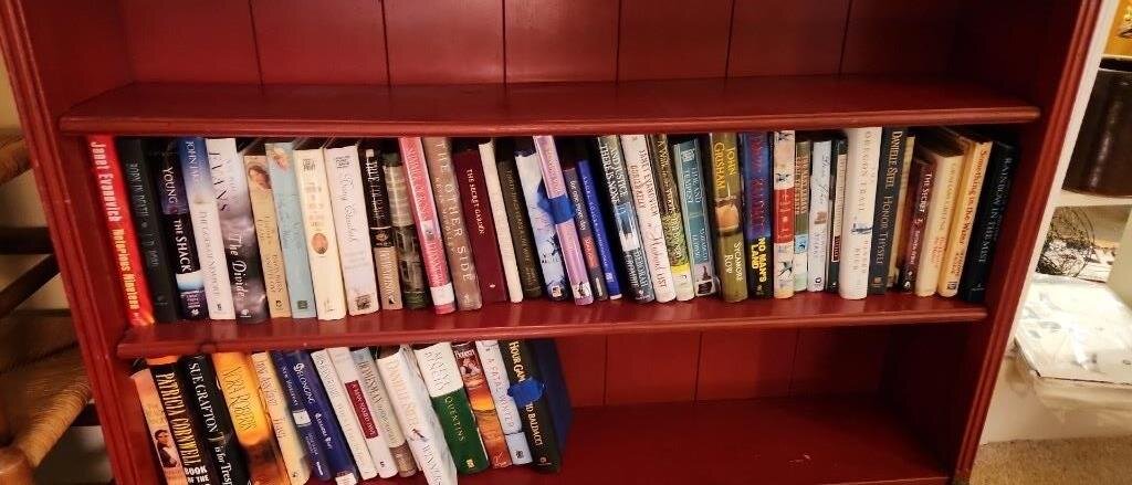 Assortment of hard back books