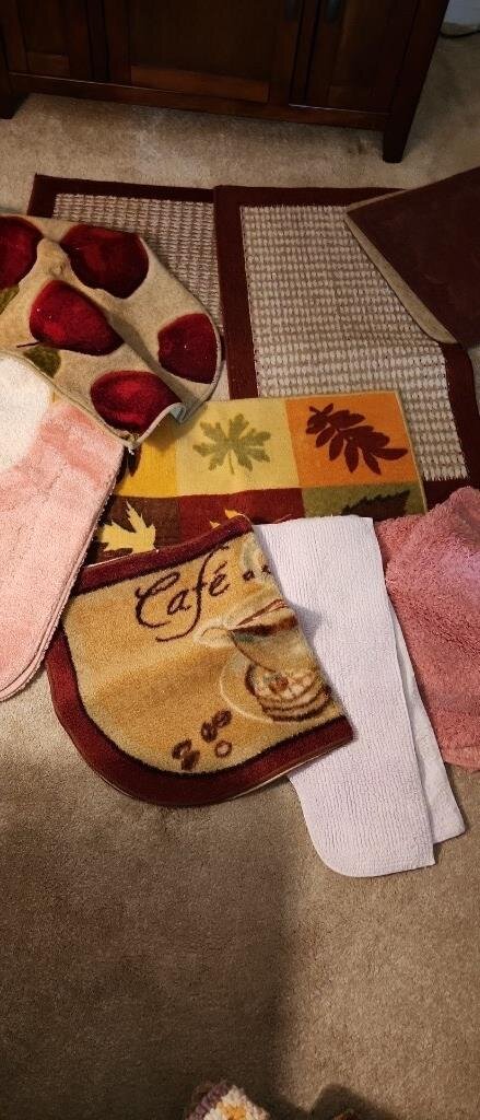 Assortment of throw rugs