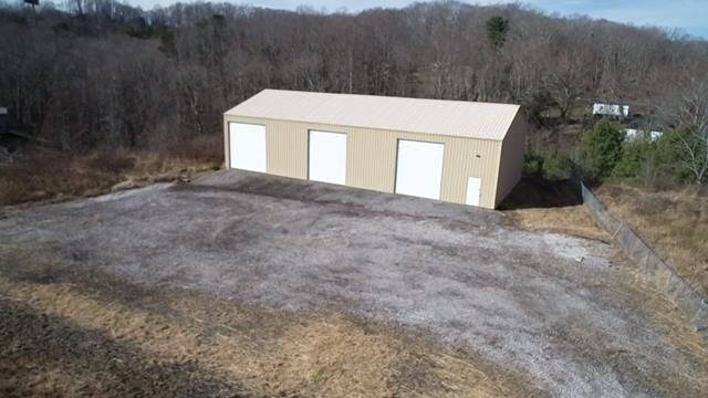 Image for SOLD $88,000 - Spacious 3-Bay Commercial Garage Near I-64 Selling to the Highest Bidder
