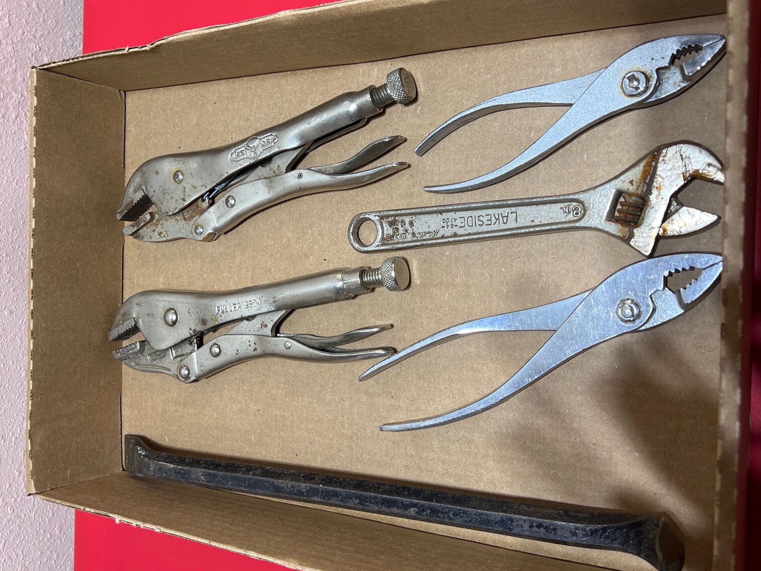 Vise grips, adjustable wrench, miscellaneous pliers, prybar