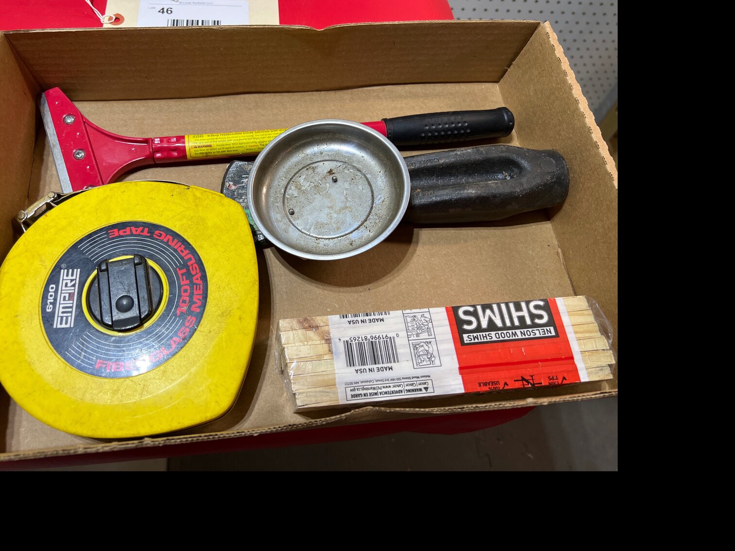 100 foot tape measure, splitting wedge, scraper, magnetic tray 