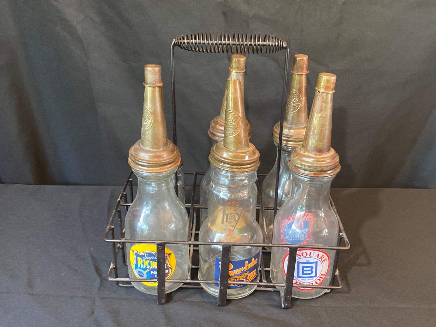 (6) MISC OIL BOTTLES WITH RACK