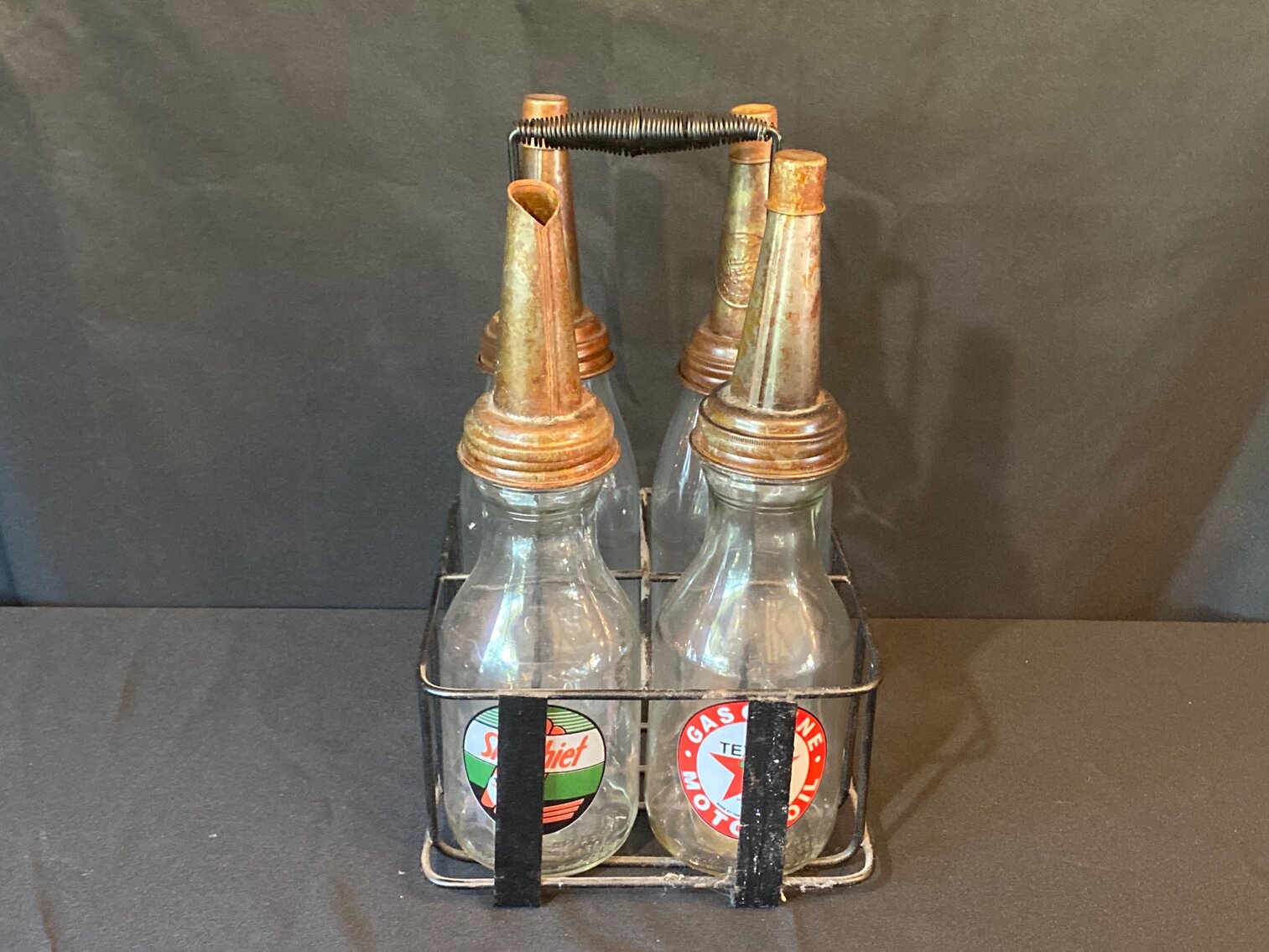 (4) TEXACO OIL BOTTLES WITH RACK