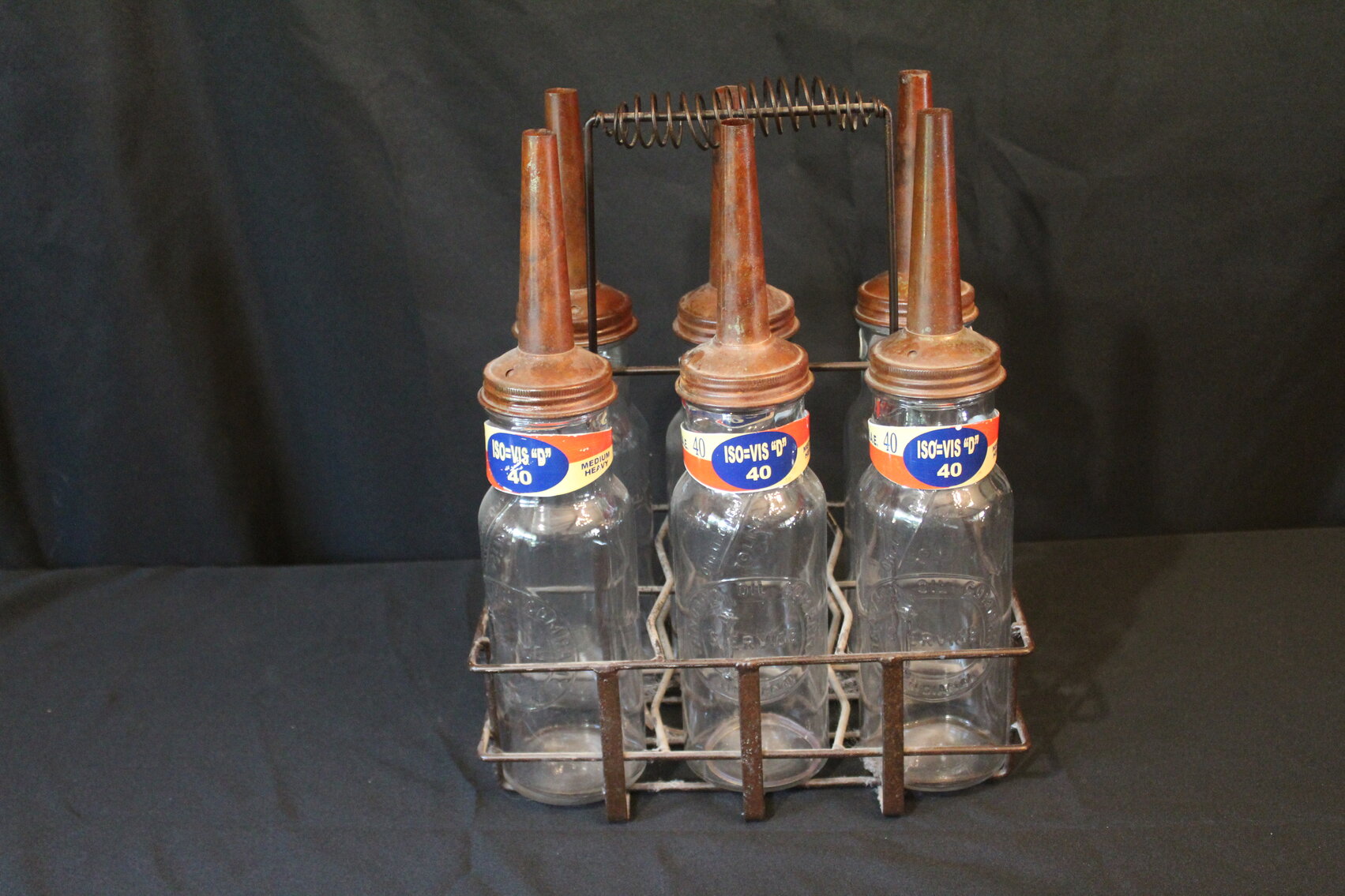 (6) STANDARD OIL BOTTLES WITH RACK