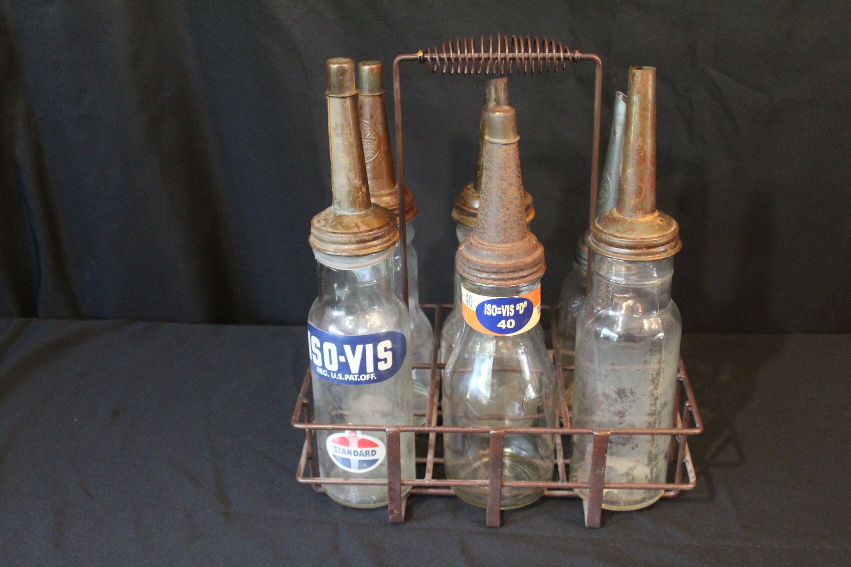(6) STANDARD OIL AND PHILLIPS OIL BOTTLES WITH RACK