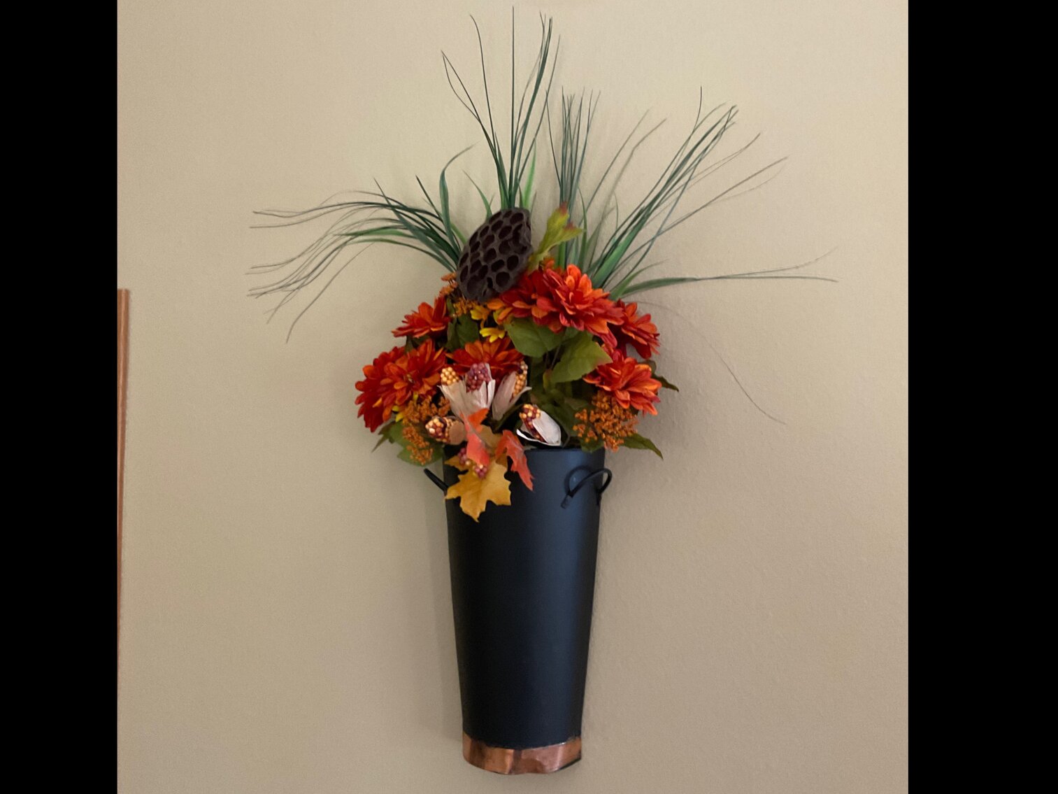 Beautiful flowers on wall vase