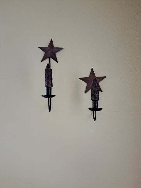 2 candle star wall sconces 