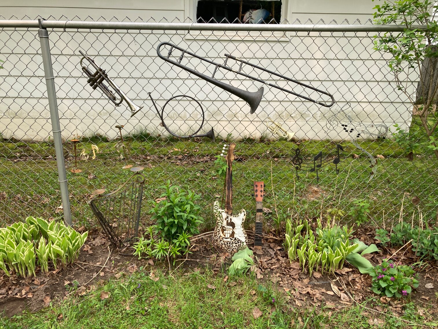Musical Instruments Used As Fence Decorations 