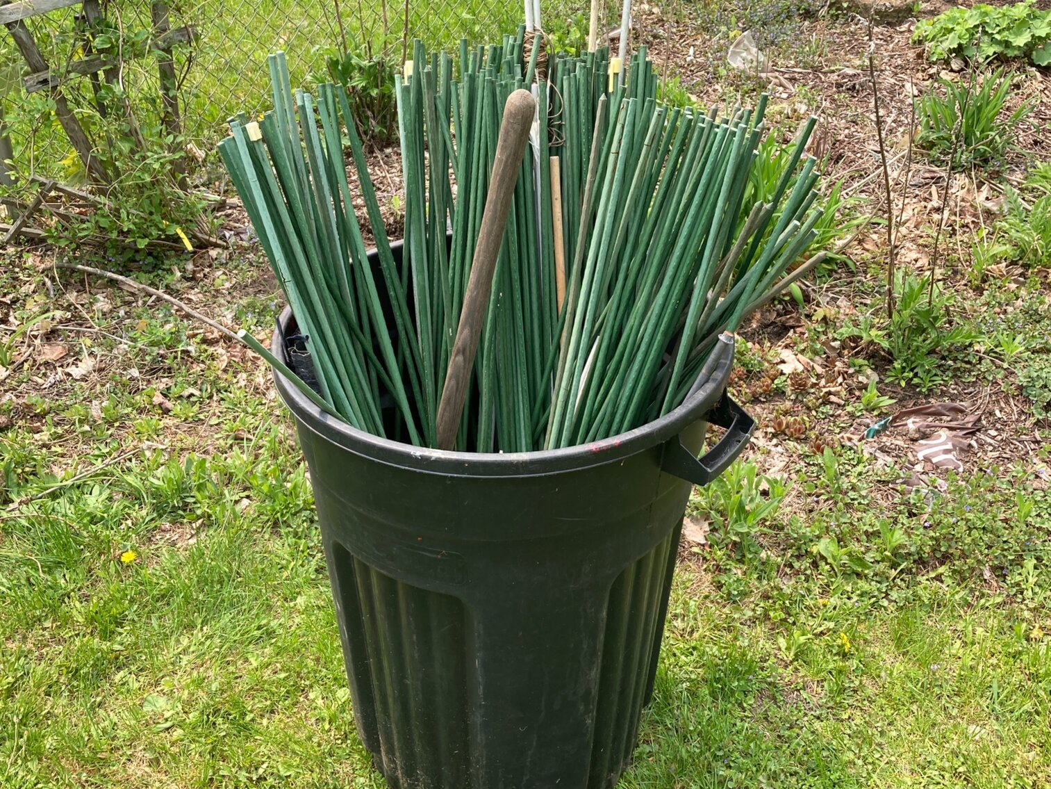 Trash Can Of Poles And Steaks