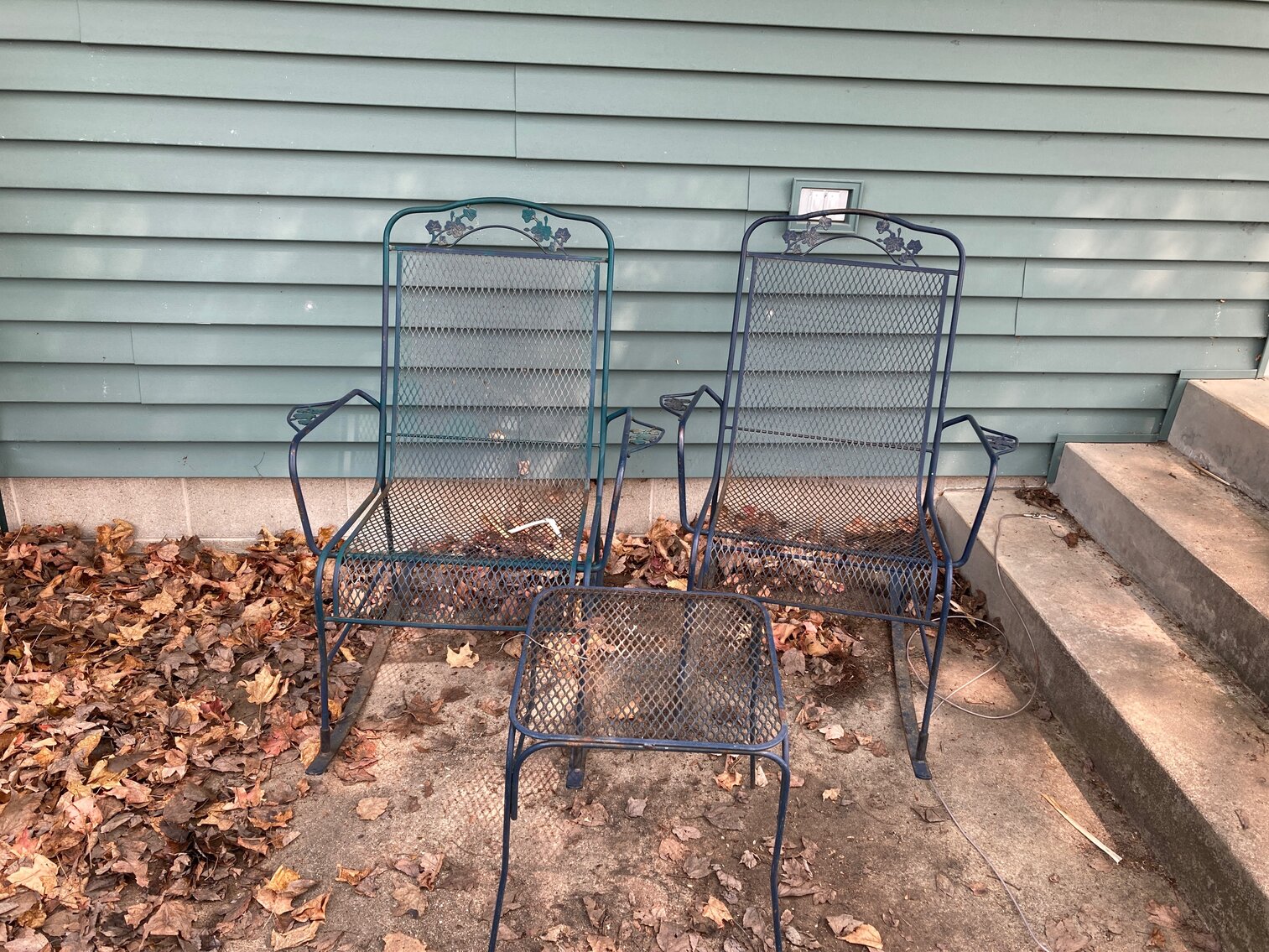 2 Metal Rocking Chairs And Table 