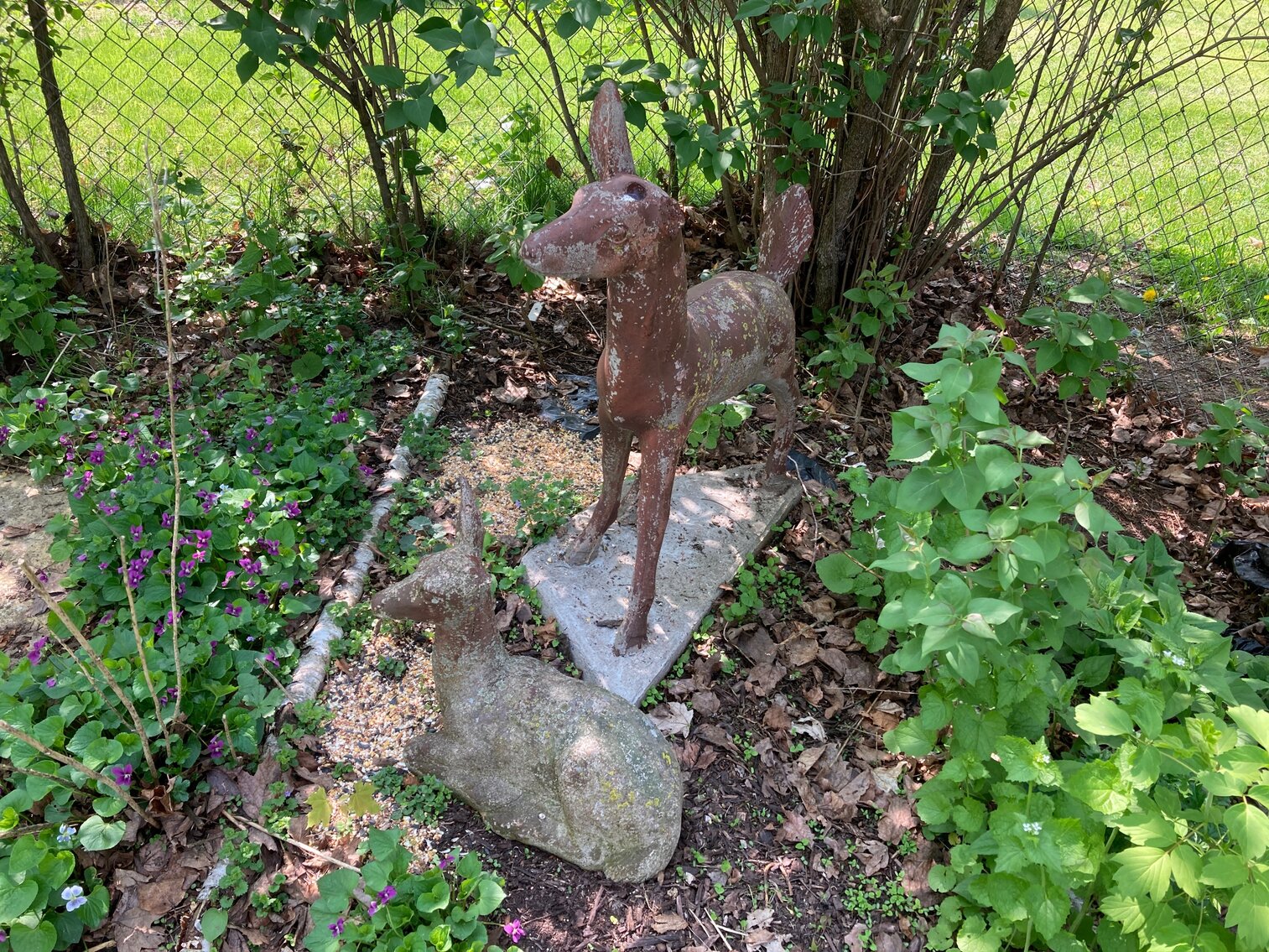 2 Deer Statues Both Missing An Ear