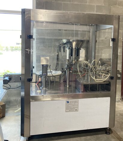 Image for ***SOLD*** MJK1585 Shanghai Yanban Automatic 4 Head High Speed Filler /Capper (Machine tag is blank) 