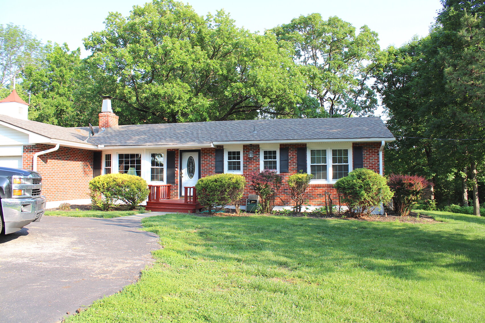 Real Estate & Contents Sales Auction in Warrensburg, MO Auctioneer