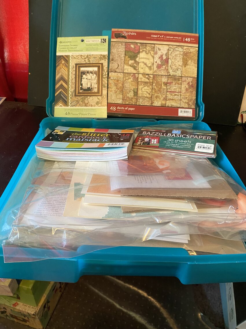 Lot of Scrapbooking Paper in Blue Case