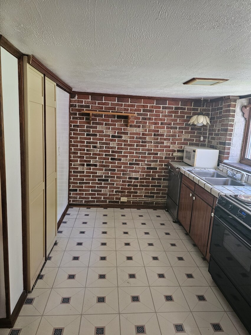 Image for SOLD $277,750 - Two Homes and Commercial Building in Beckley Selling to The Highest Bidder