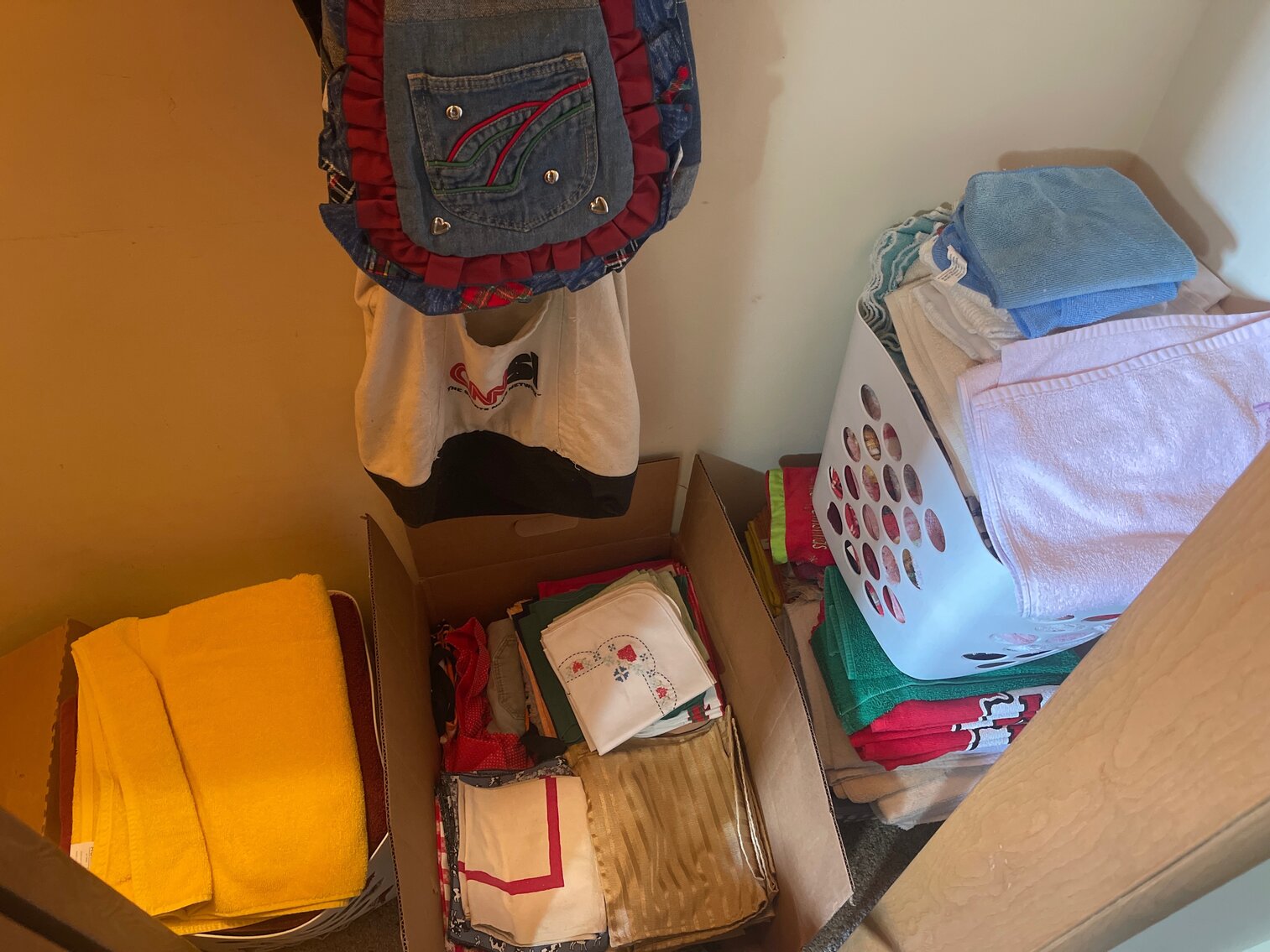 Towels, linens , tote bags in closet