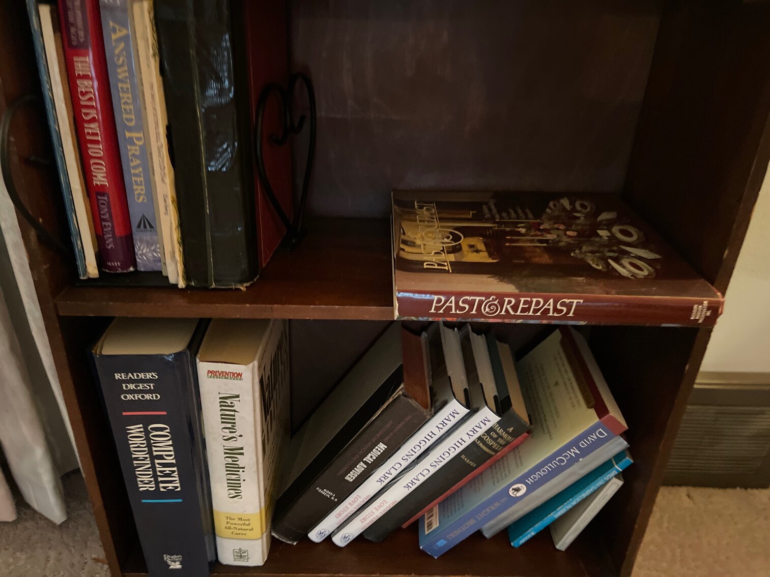 Contents of small bookcase in living room
