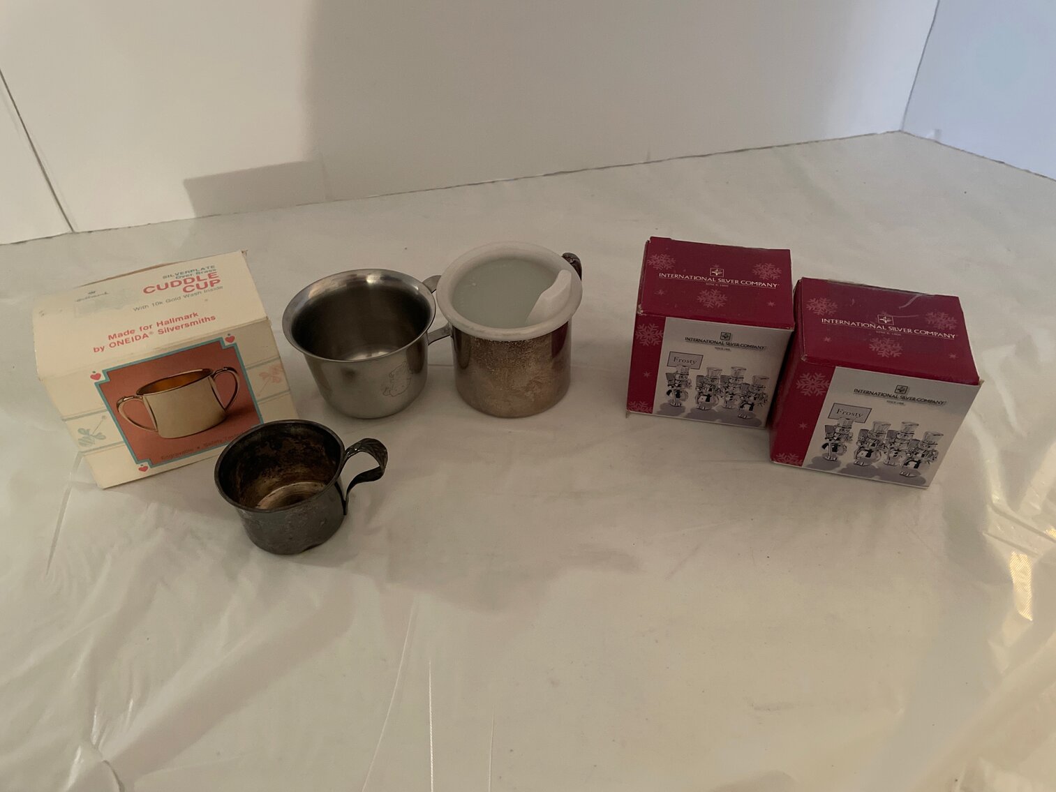 Silver plated 4 baby drinking cups