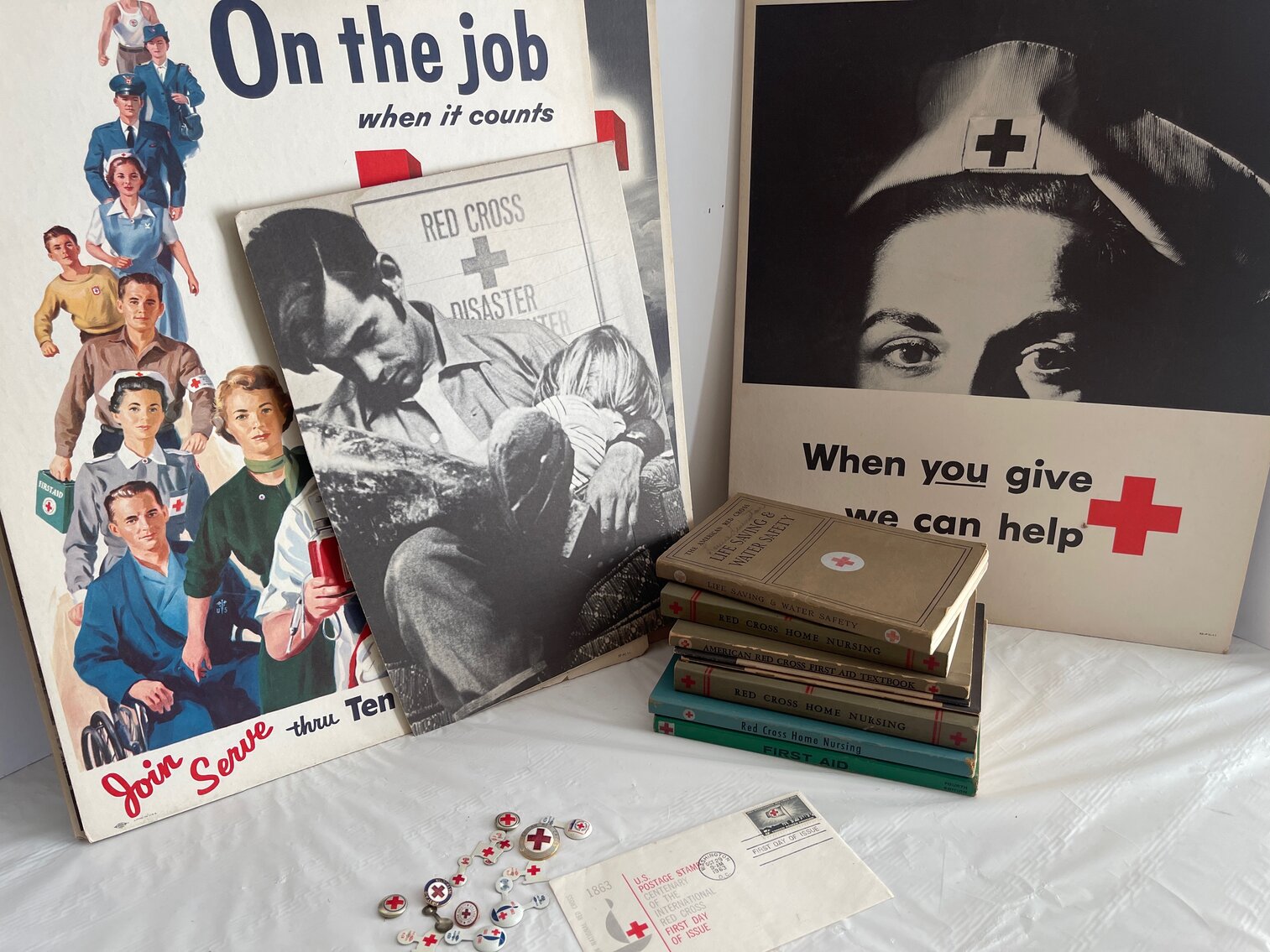 American Red Cross items, posters, flags, pins, 1963 first day issue postmark of 100th year of Red Cross
