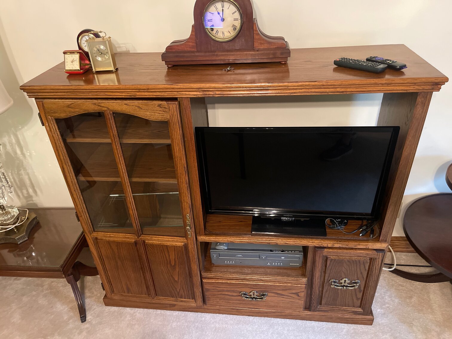 Entertainment center with glass door