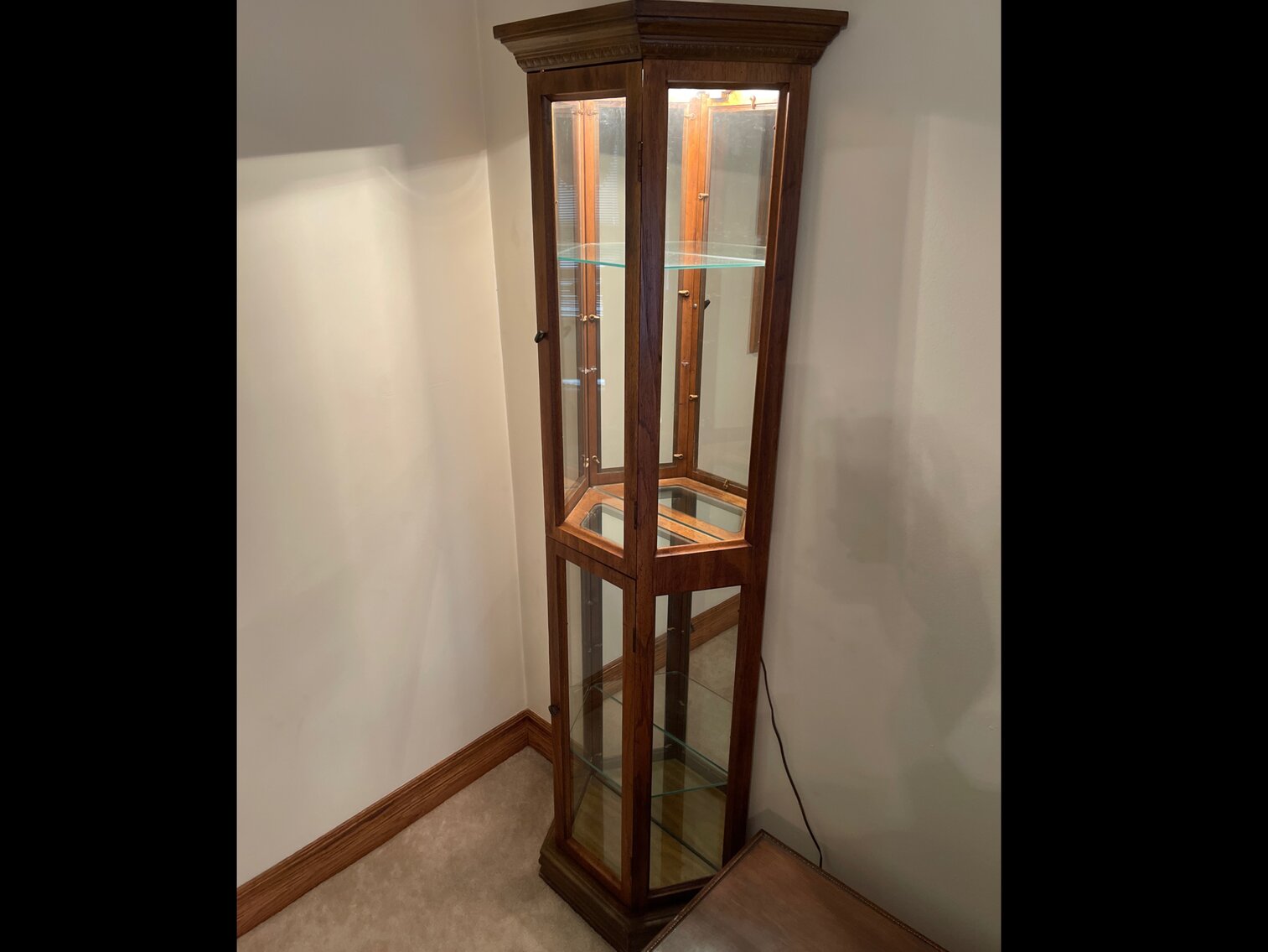 Curio cabinet - three panel glass, with mirror back