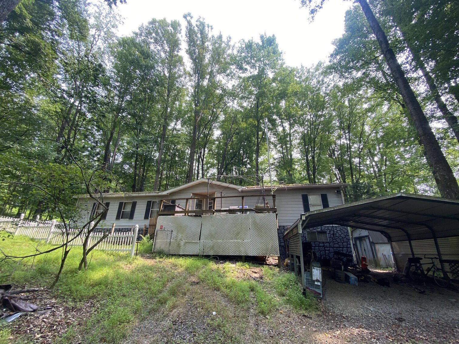 Image for SOLD $151,250 - 2.5 Wooded Acres with Mobile Home Selling to the Highest Bidder