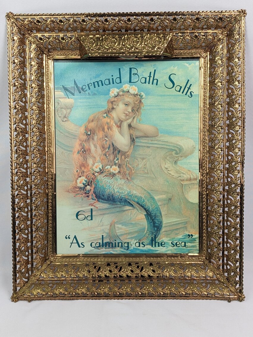 Metal Mermaid Ad in Lit Metal Frame