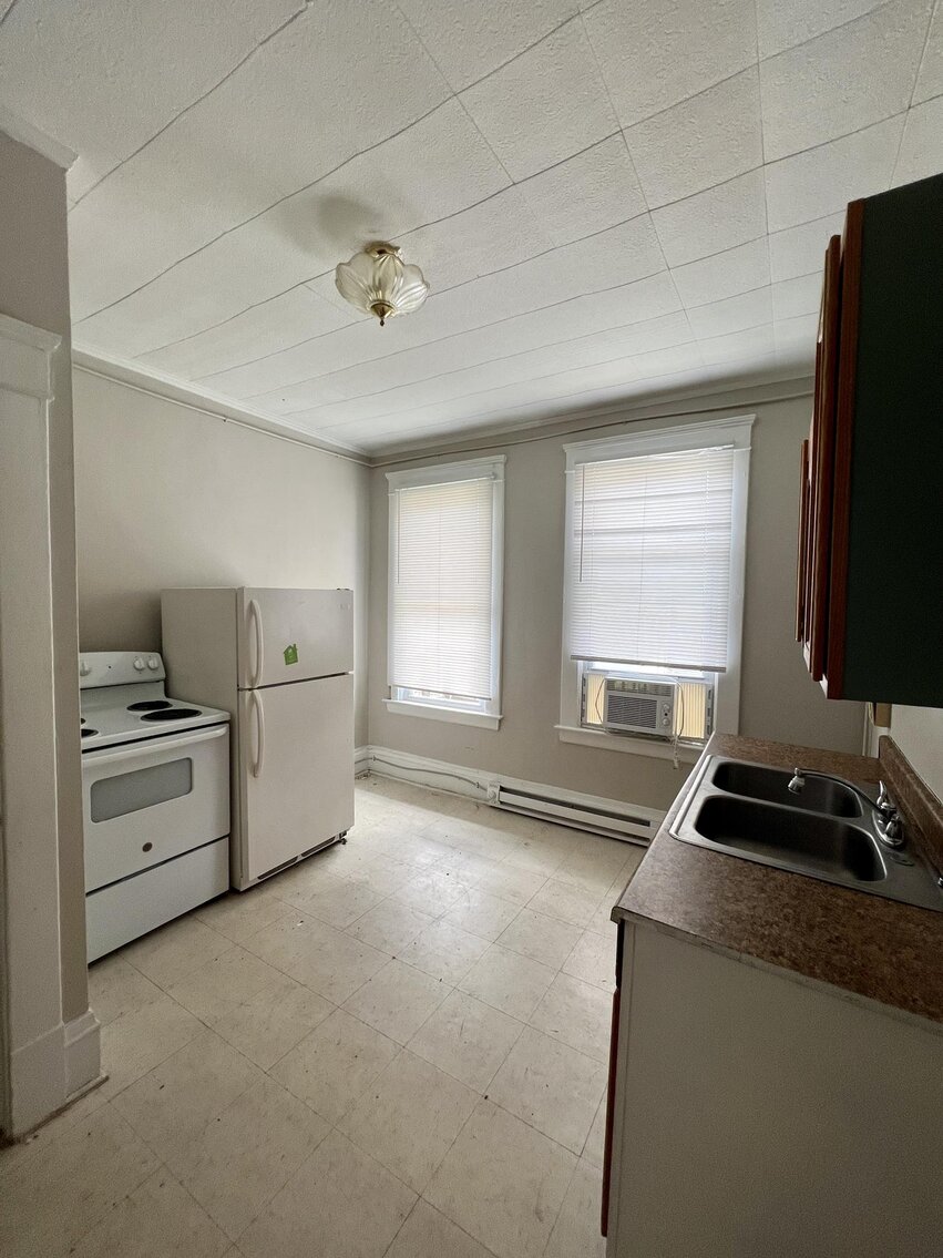 Image for SOLD $108,900 - Triplex Near the Capitol Selling to the Highest Bidder