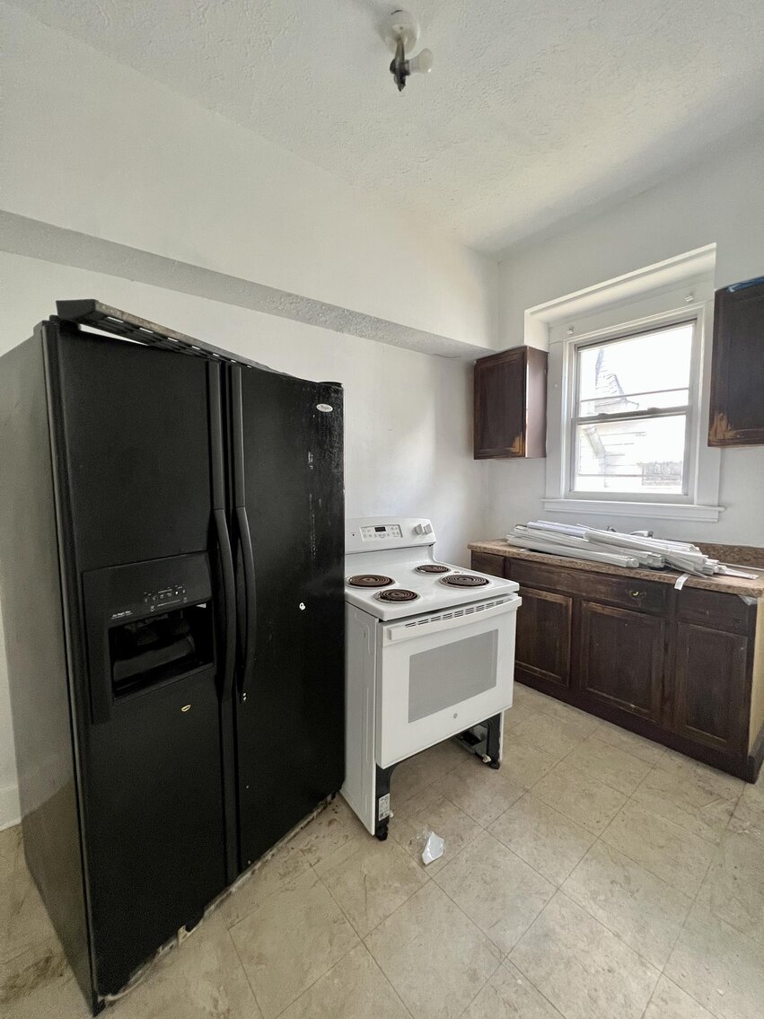 Image for SOLD $108,900 - Triplex Near the Capitol Selling to the Highest Bidder