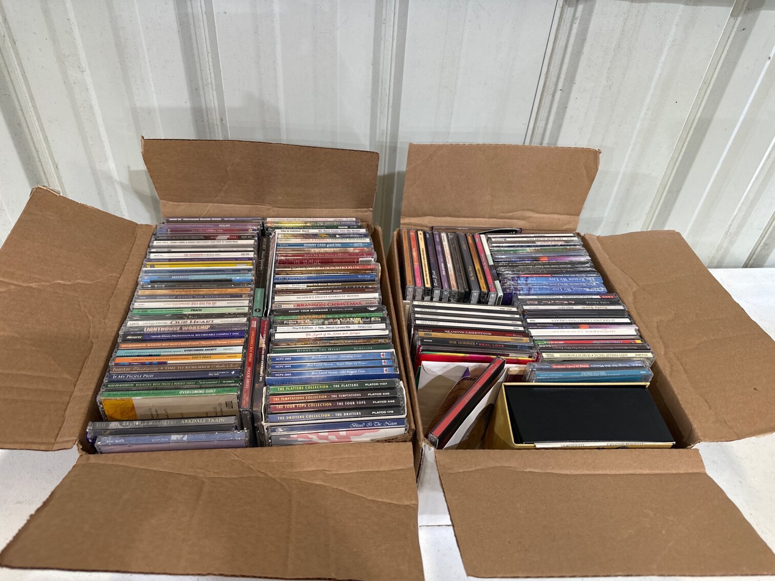 2 Boxes Of CDs