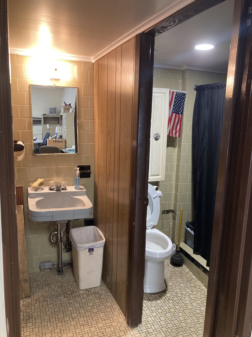 Image for COMMERCIAL OFFICE WITH SHOP AND STORAGE;  TWO STORY HOUSE WITH TWO RENTAL UNITS ON .40 +/- AC CORNER LOT CONVENIENT LOCATION OFF CATON AVE, I-695