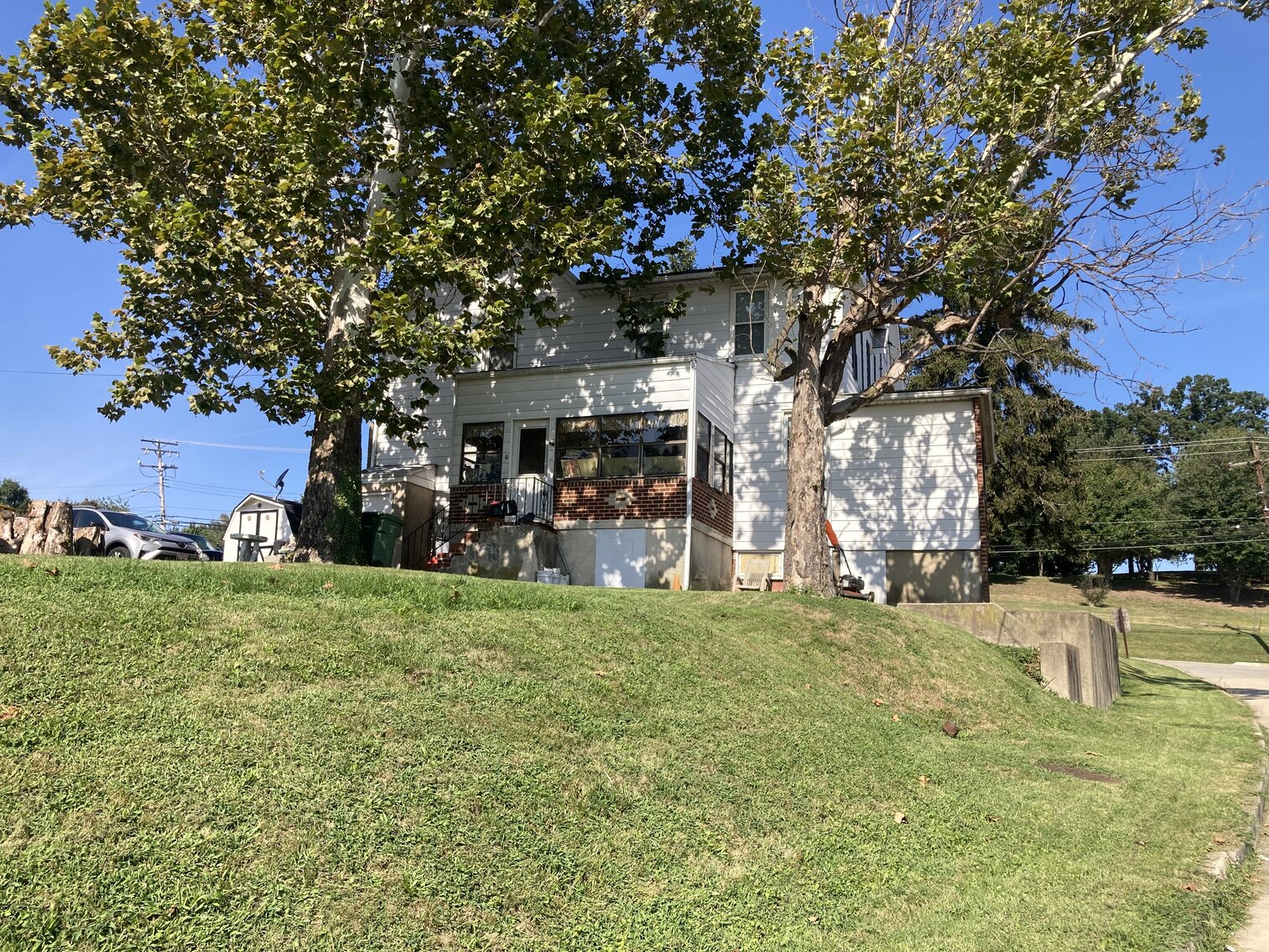 Image for COMMERCIAL OFFICE WITH SHOP AND STORAGE;  TWO STORY HOUSE WITH TWO RENTAL UNITS ON .40 +/- AC CORNER LOT CONVENIENT LOCATION OFF CATON AVE, I-695