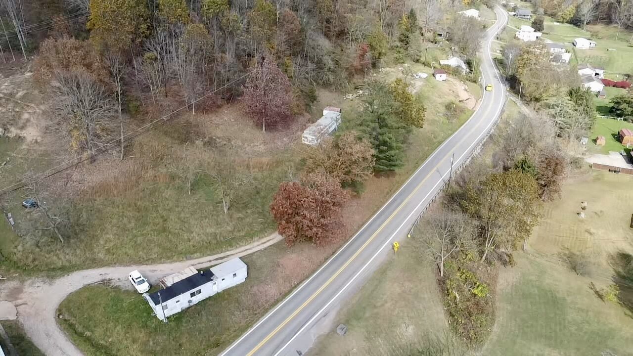 Image for SOLD $71,500 - Investment Opportunity – Three Homes & Mobile Home Park