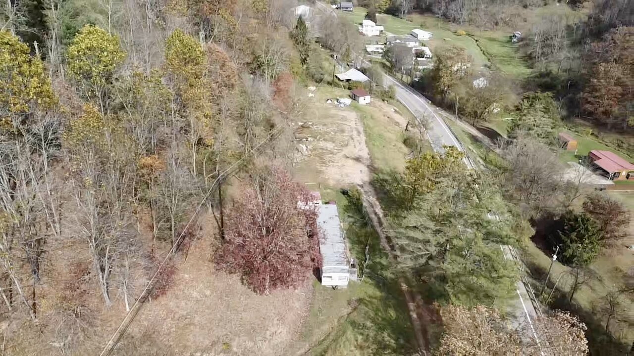 Image for SOLD $71,500 - Investment Opportunity – Three Homes & Mobile Home Park