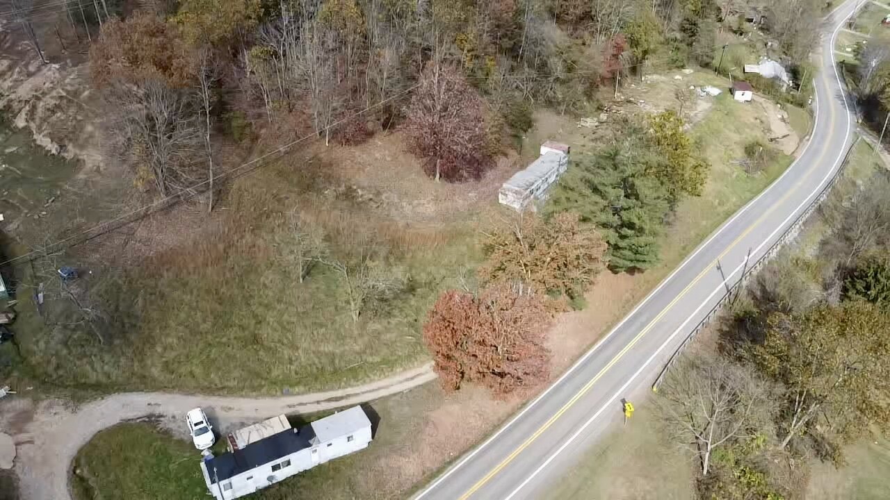 Image for SOLD $71,500 - Investment Opportunity – Three Homes & Mobile Home Park