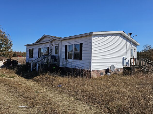 Image for SOLD! Public Trustee Sale | 3 BR/2 BA Modular Home | 1,166± SF | 2.24± AC Lot | Open Floor Plan | 26282 Peters Bridge Road | Courtland, VA